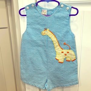 Adorable seer sucker giraffe Jon Jon